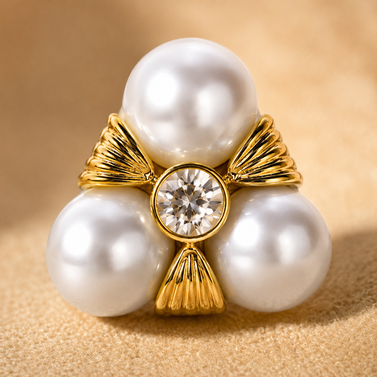 Extreme macro detail of a gold-plated stud earring, highlighting the lustrous texture of the white imitation pearls, the facets of the clear zircon crystal, and the intricate gold accents — House of Ruhira